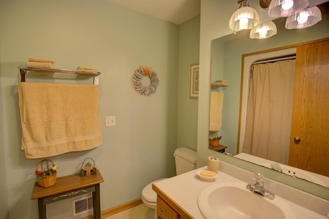 1414 Plains Rd, Leslie, MI 49251 - bathroom with baseboards, toilet, a shower with curtain, and vanity