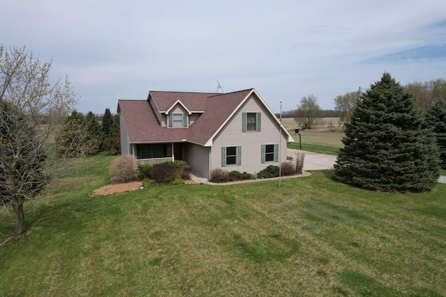 1414 Plains Rd, Leslie, MI 49251 - view of front of house with a front yard