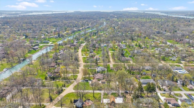 bird's eye view with a residential view and a view of trees