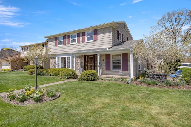 traditional home featuring a front yard