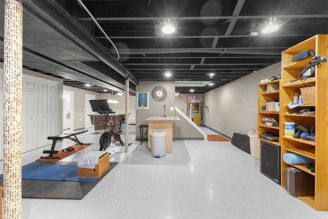 finished basement featuring tile patterned floors