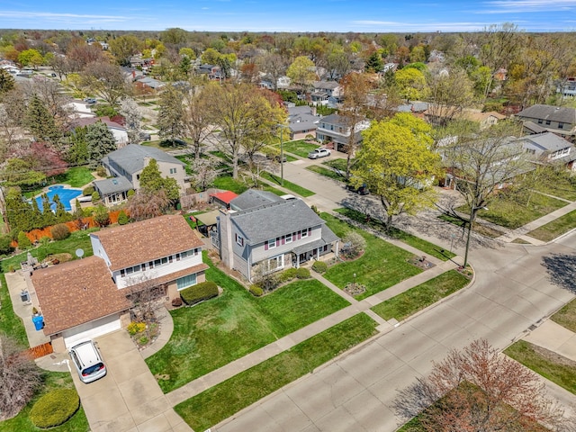 birds eye view of property with a residential view