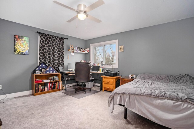bedroom with light carpet and ceiling fan