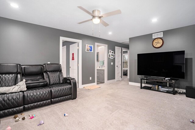 carpeted living room with baseboards, visible vents, ceiling fan, and recessed lighting