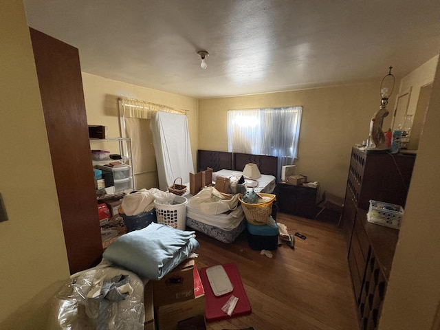 bedroom with wood finished floors