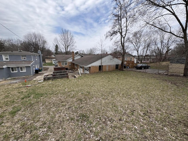 view of yard featuring a residential view