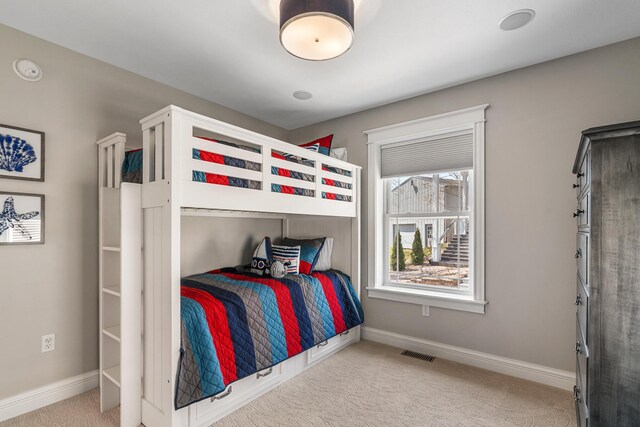 1300 N Eagle Lake Dr, Kalamazoo, MI 49009 - carpeted bedroom featuring visible vents and baseboards