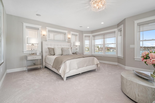 1300 N Eagle Lake Dr, Kalamazoo, MI 49009 - bedroom with baseboards, recessed lighting, and light carpet