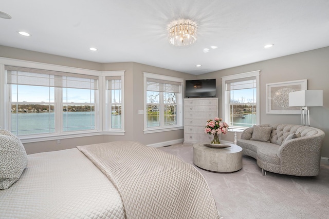 1300 N Eagle Lake Dr, Kalamazoo, MI 49009 - carpeted bedroom featuring baseboards, recessed lighting, and a chandelier