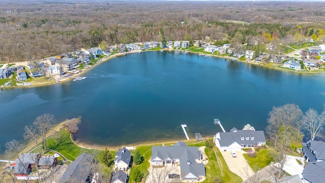 1300 N Eagle Lake Dr, Kalamazoo, MI 49009 - aerial view with a wooded view, a water view, and a residential view