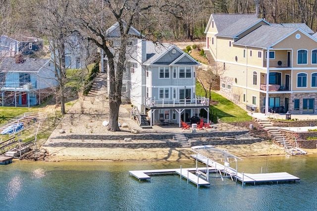 1300 N Eagle Lake Dr, Kalamazoo, MI 49009 - exterior space with a deck with water view and stairs