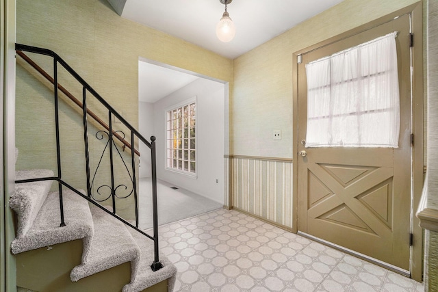 foyer entrance featuring stairway