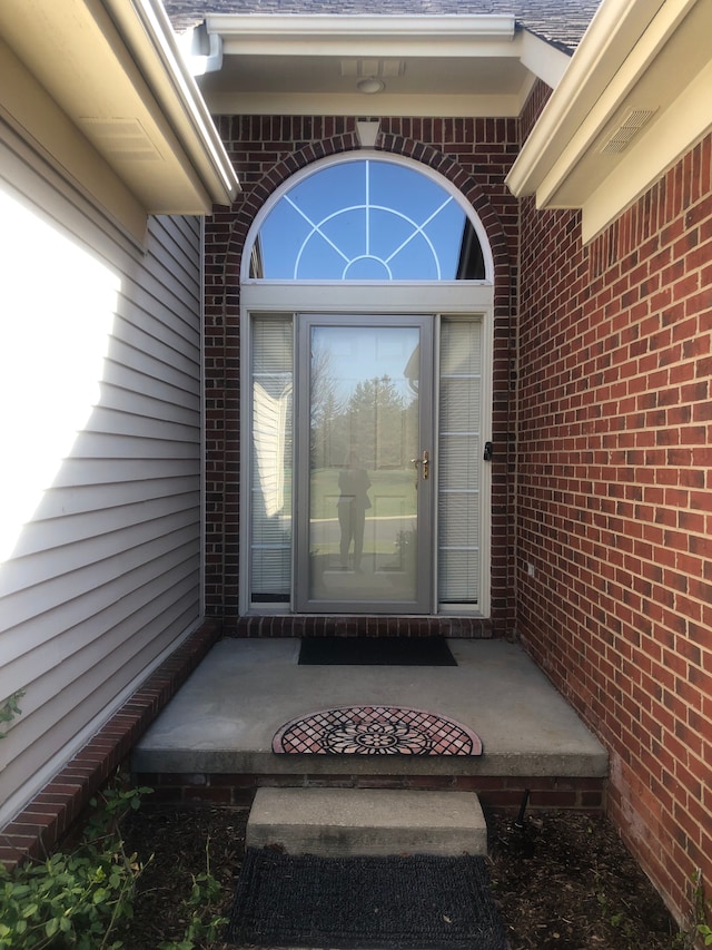 1130 Andover Cir, Commerce Twp, MI 48390 - entrance to property with brick siding