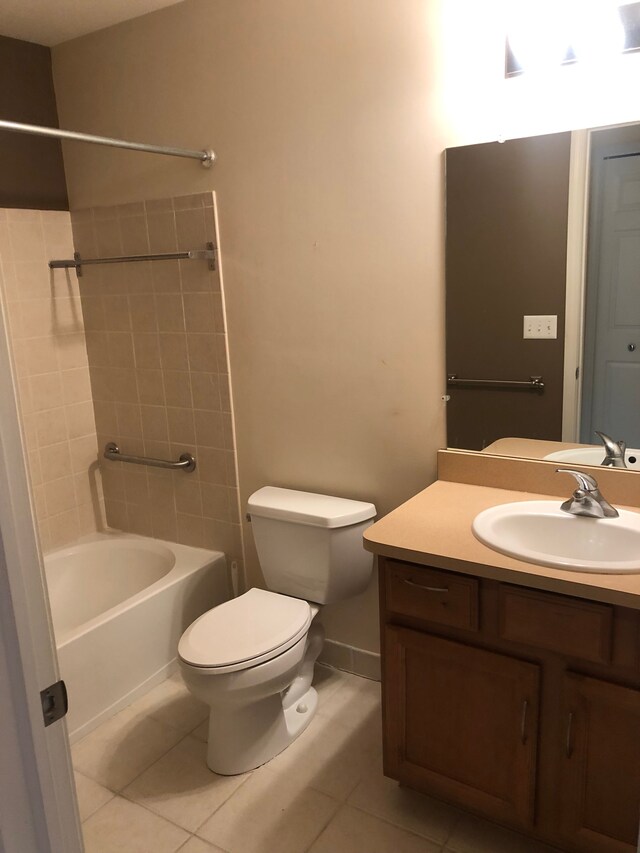 1130 Andover Cir, Commerce Twp, MI 48390 - full bath featuring tile patterned floors, toilet, vanity, bathing tub / shower combination, and baseboards
