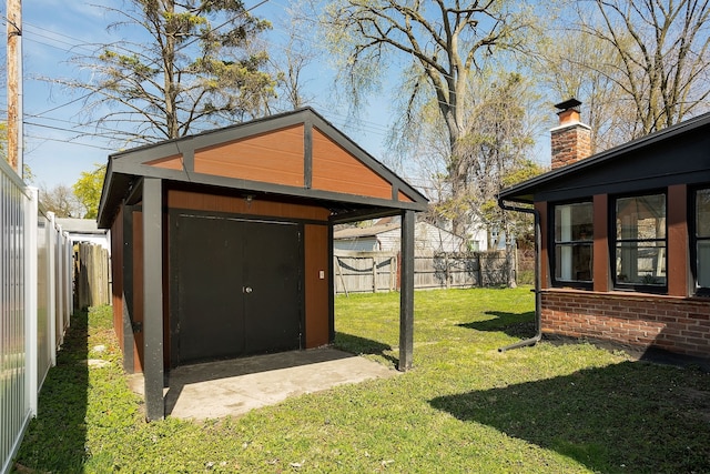 view of shed featuring a fenced backyard