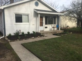 508 Lexington Ave, East Lansing, MI 48823 - bungalow-style home featuring a front yard and a chimney