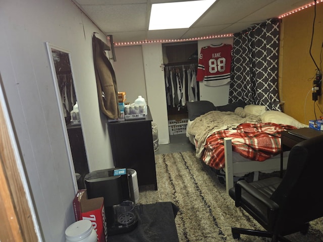 508 Lexington Ave, East Lansing, MI 48823 - bedroom with concrete flooring and a paneled ceiling