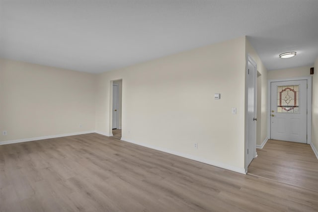 9315 Kingsley Dr, Onsted, MI 49265 - empty room with light wood finished floors and baseboards