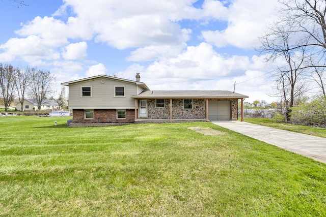 9315 Kingsley Dr, Onsted, MI 49265 - split level home featuring a chimney, brick siding, driveway, a front lawn, and an attached garage