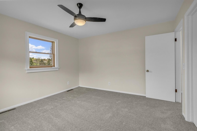 9315 Kingsley Dr, Onsted, MI 49265 - spare room with visible vents, a ceiling fan, baseboards, and carpet floors
