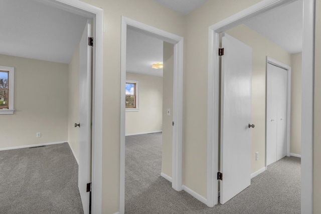 9315 Kingsley Dr, Onsted, MI 49265 - hallway featuring carpet and baseboards