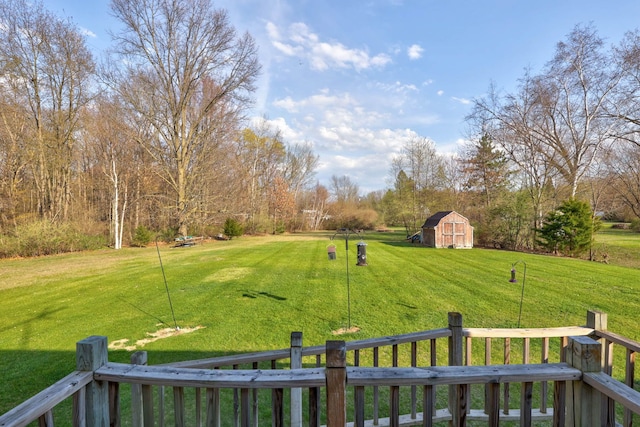 view of yard featuring a barn and an outdoor structure