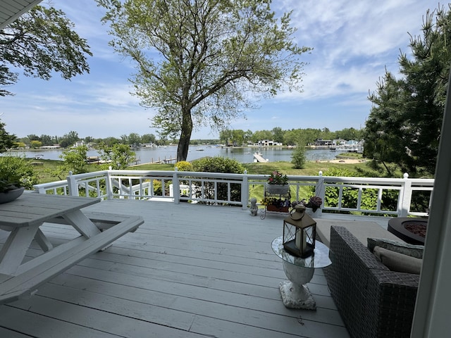 16933 Royal Ln, Spring Lake, MI 49456 - wooden deck with a water view