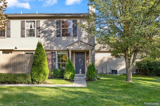 180 Pine Tree Ridge Dr Unit 3, Waterford, MI 48327 - view of front of property featuring central AC and a chimney