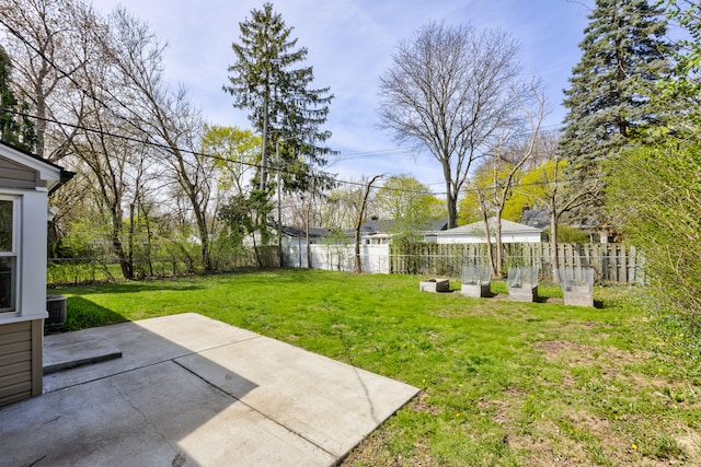 view of yard with a fenced backyard and a patio area