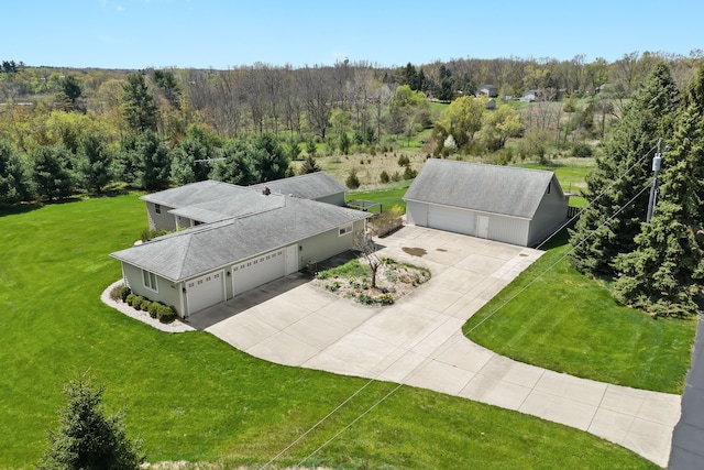 5480 Kensington Rd, Brighton, MI 48114 - view from above of property with a heavily wooded area