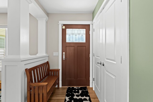 5480 Kensington Rd, Brighton, MI 48114 - doorway to outside with wood finished floors