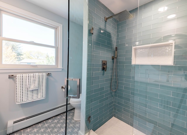 full bath featuring baseboard heating, toilet, and tiled shower