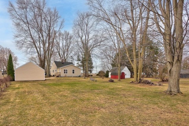 1743 Midland Rd, Bay City, MI 48706 - view of grassy yard with an outdoor structure