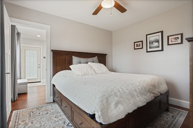 1743 Midland Rd, Bay City, MI 48706 - bedroom with light wood finished floors, baseboards, and ceiling fan