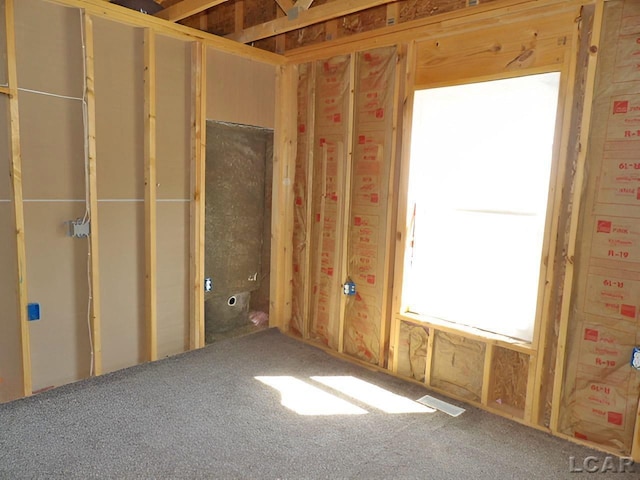 7640 S Lake Pleasant Rd, Osseo, MI 49266 - misc room featuring carpet flooring