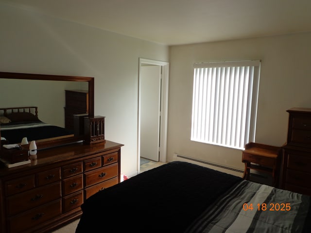bedroom featuring baseboard heating