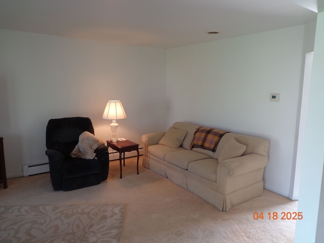 carpeted living room with baseboard heating
