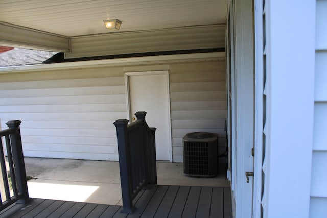 33185 Swallow Dr, Rockwood, MI 48173 - wooden deck featuring central air condition unit