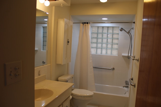 33185 Swallow Dr, Rockwood, MI 48173 - full bathroom featuring shower / bath combo with shower curtain, toilet, and vanity