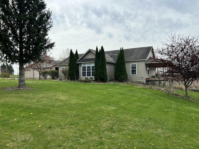 back of house with a yard