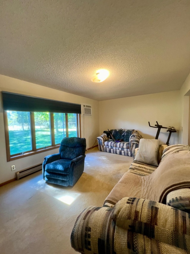 carpeted living area featuring a baseboard heating unit, an AC wall unit, and a textured ceiling