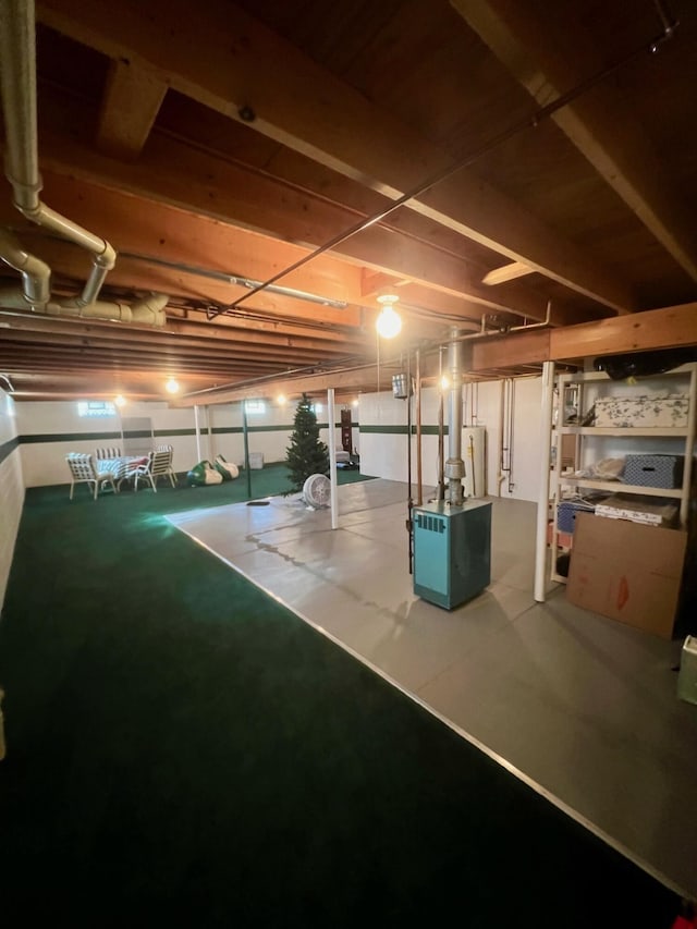 unfinished below grade area with gas water heater