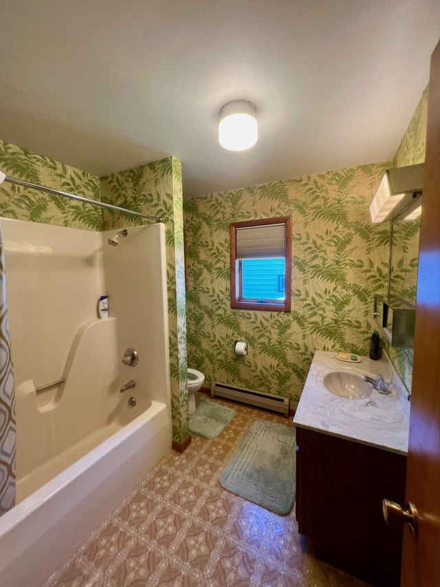 full bathroom featuring vanity, tile patterned floors, toilet, baseboard heating, and wallpapered walls