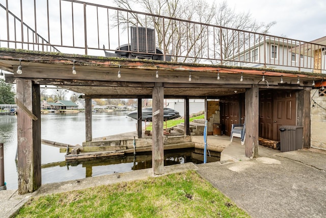 6950 Shore Dr, Coloma, MI 49038 - dock area featuring central AC, a water view, and boat lift