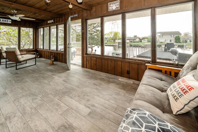 6950 Shore Dr, Coloma, MI 49038 - sunroom / solarium featuring wood walls and ceiling fan