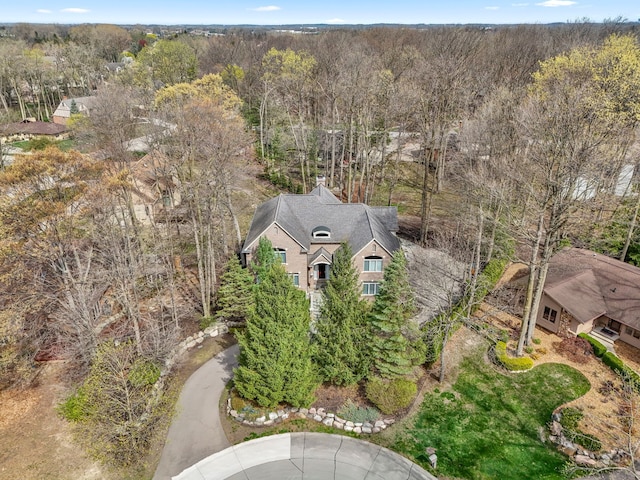 aerial view featuring a view of trees