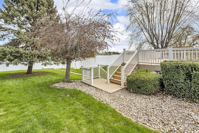 9015 Kingsley Dr, Onsted, MI 49265 - view of yard with a deck with water view and stairs