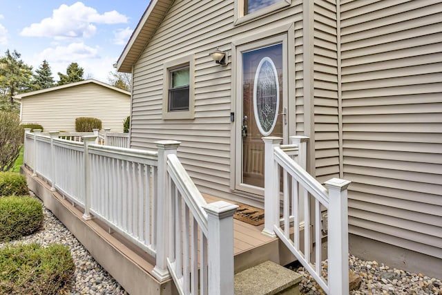 9015 Kingsley Dr, Onsted, MI 49265 - view of exterior entry featuring a deck