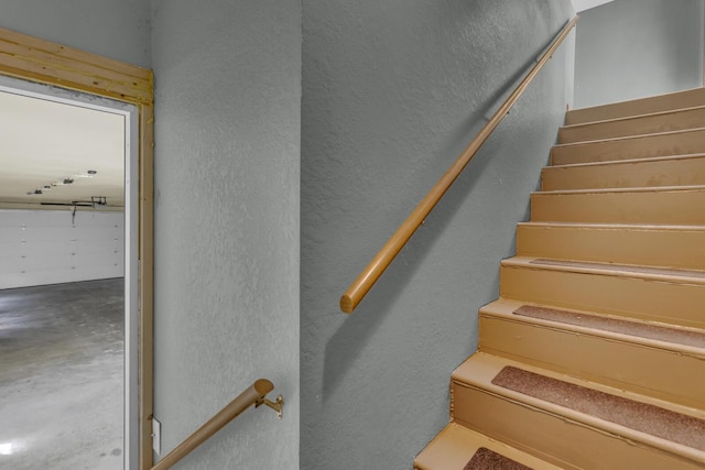 9015 Kingsley Dr, Onsted, MI 49265 - stairway with concrete floors and a textured wall