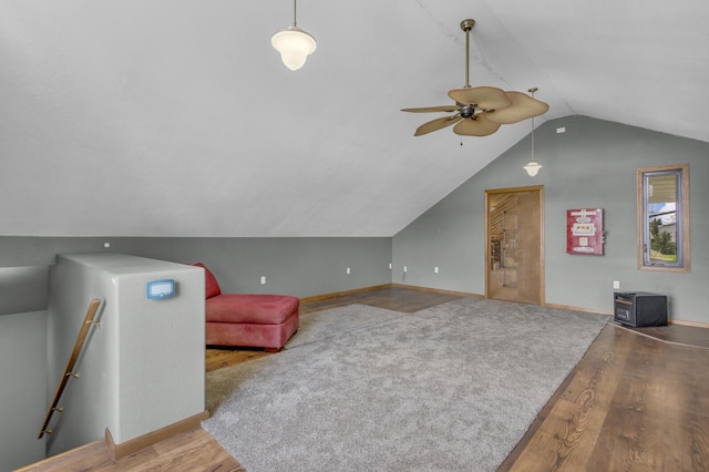 9015 Kingsley Dr, Onsted, MI 49265 - interior space with lofted ceiling, wood finished floors, an upstairs landing, and a ceiling fan